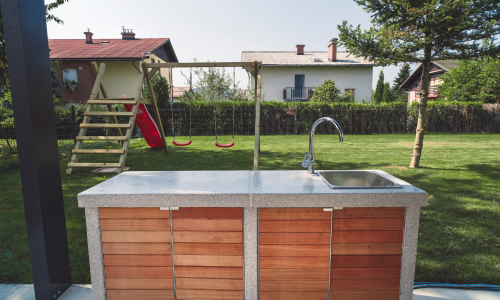 Outdoor kitchen island on concrete patio