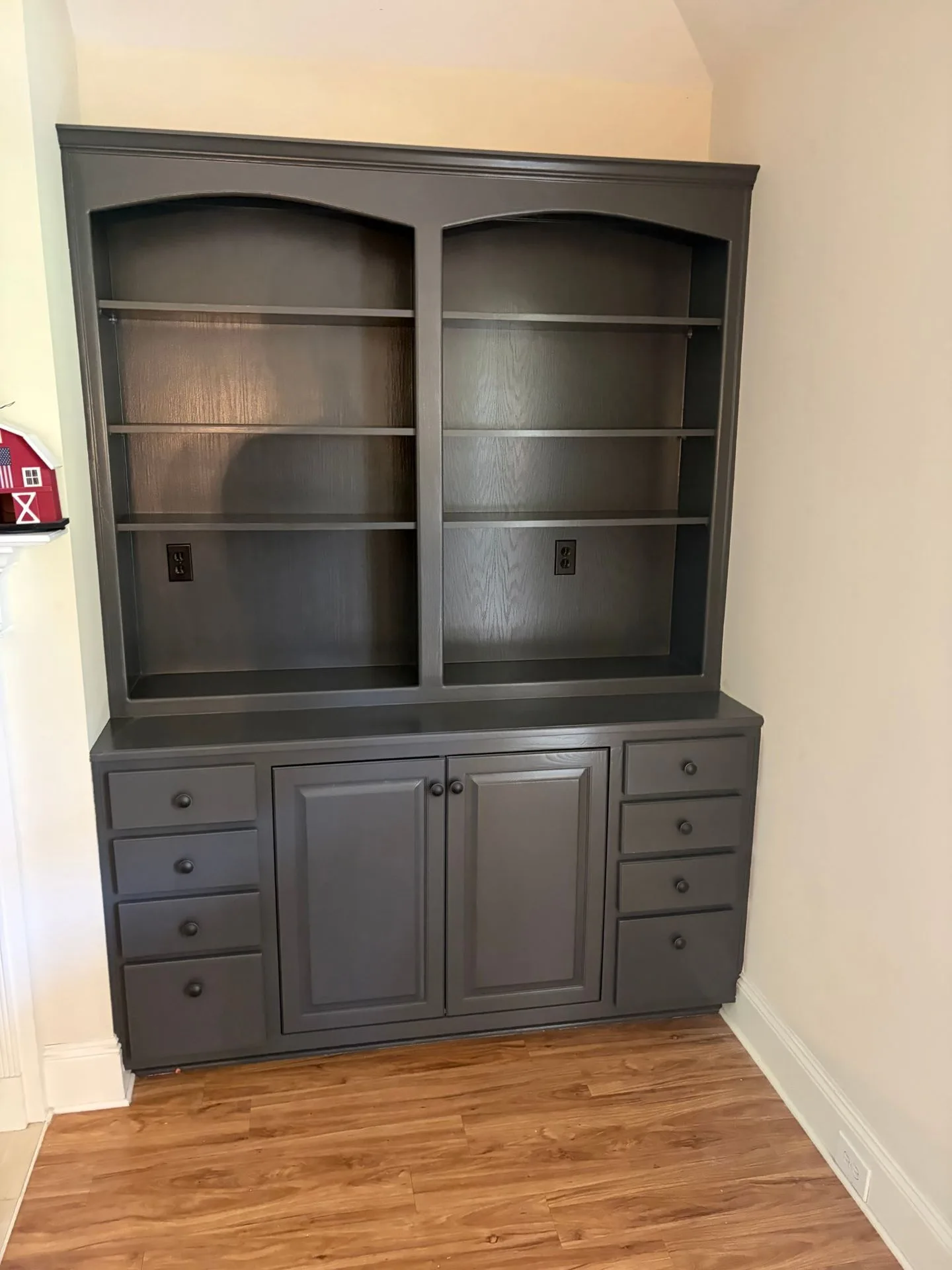 Living-room built-in bookcase repainted charcoal by 3H Construction