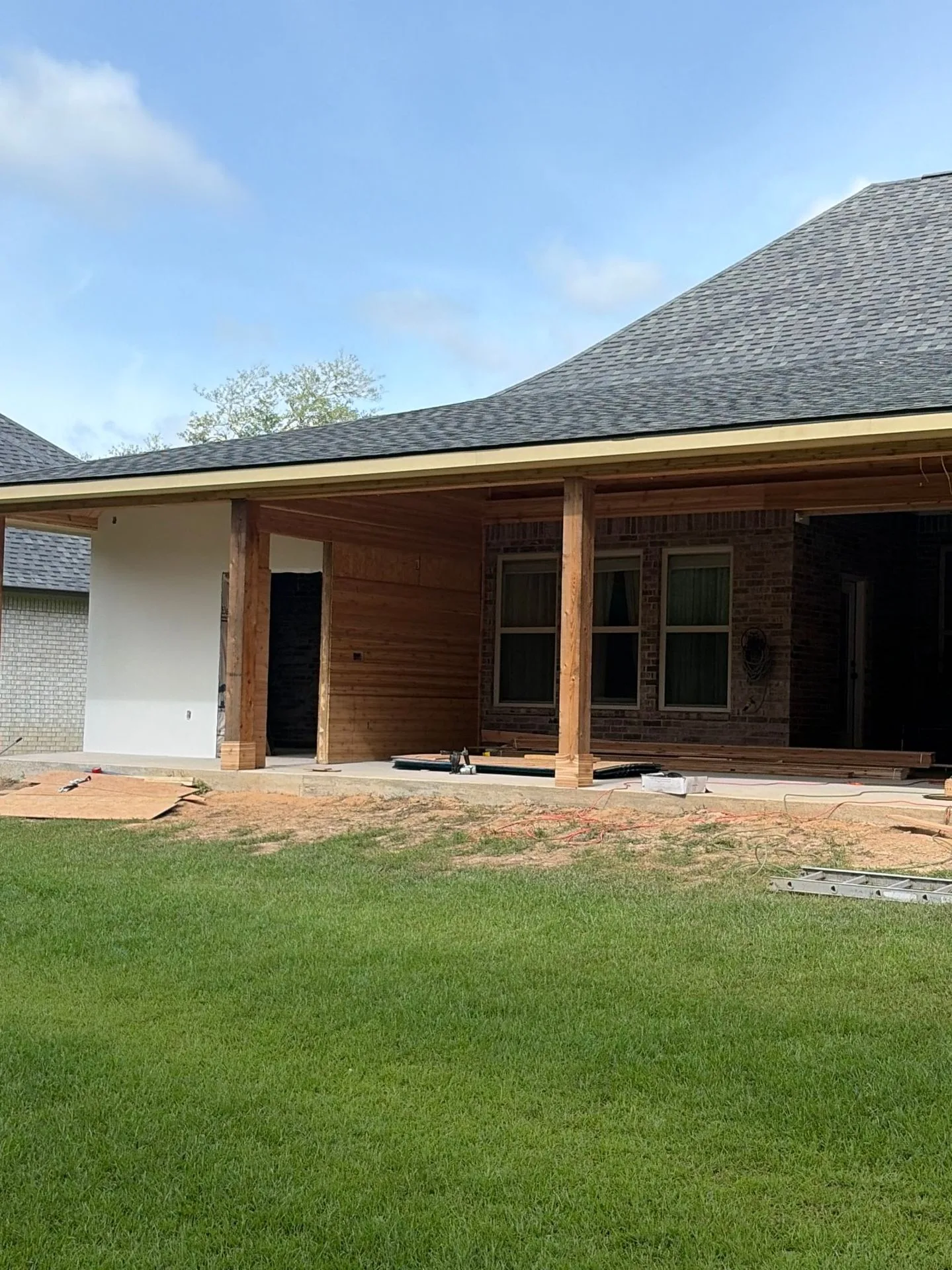 Nearly complete porch roof with shingles and fascia by 3H Construction